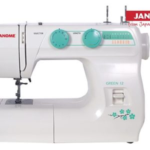 Máquina de coser Janome blanca con detalles verdes