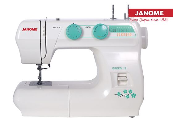 Máquina de coser Janome blanca con detalles verdes